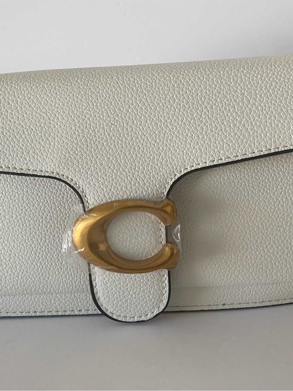 Coach White Pebbled Leather Wristlet with Gold 'C' Turnlock